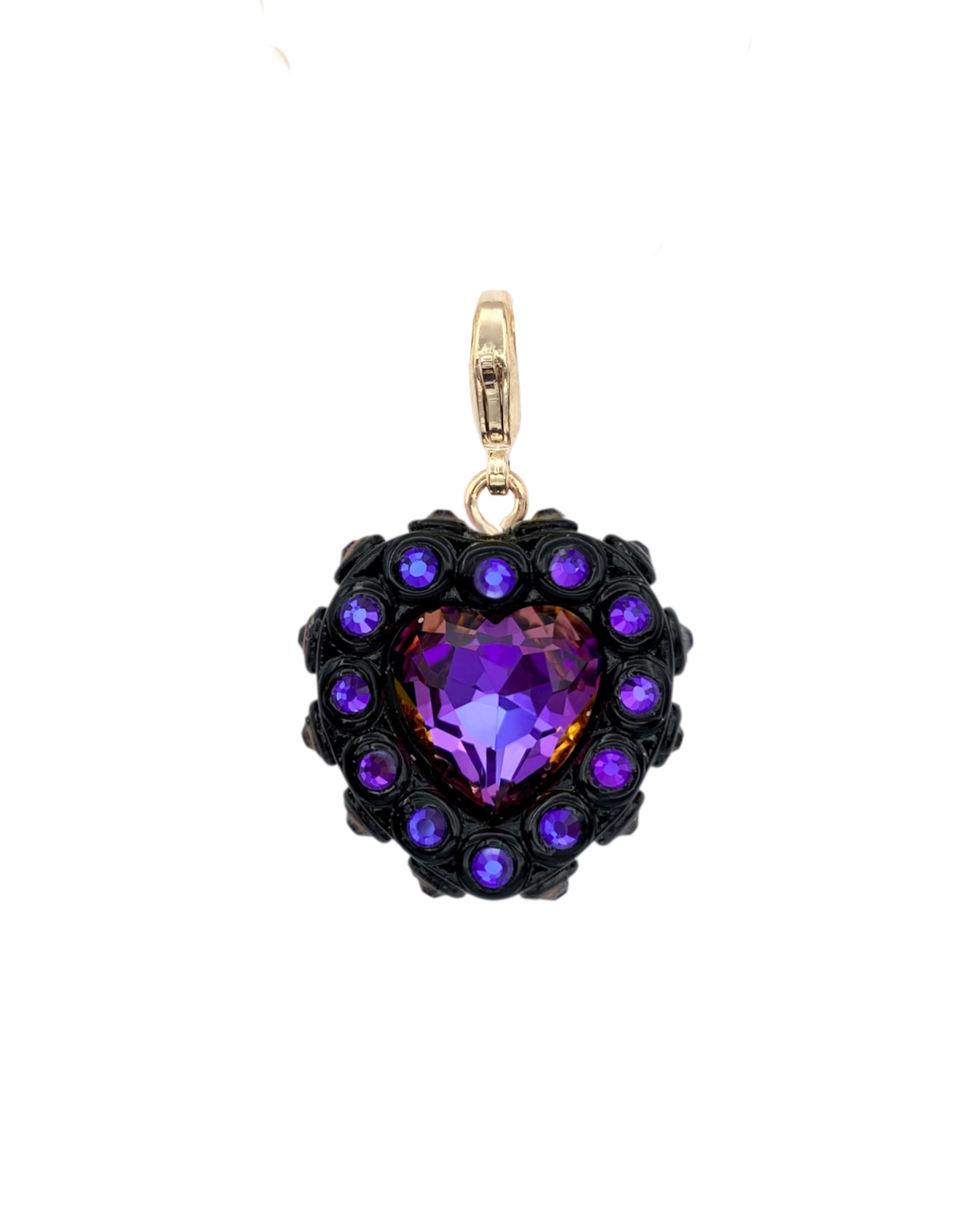Heart-shaped pendant with purple gemstone and gold accents on a white background