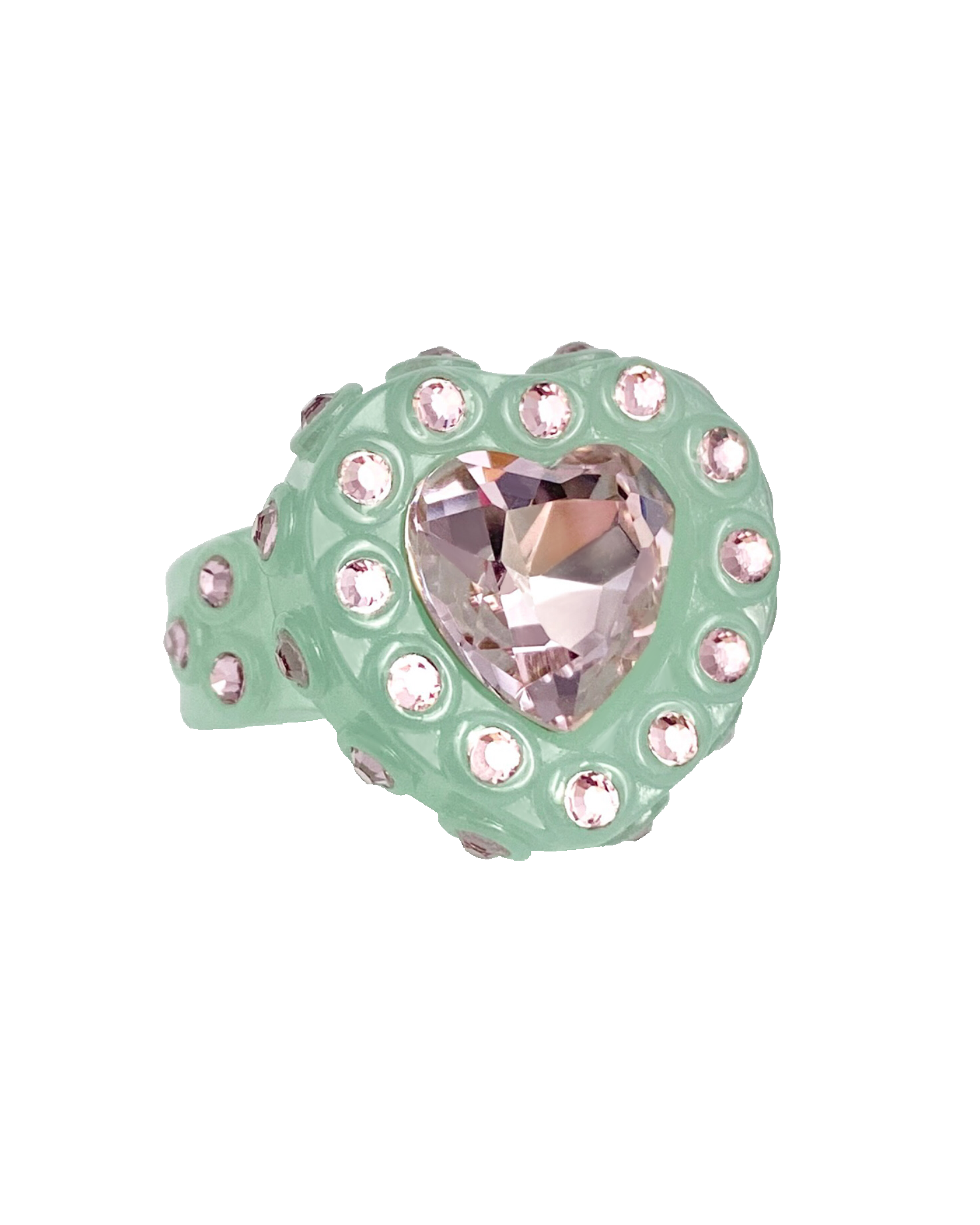 Ring with heart-shaped pink gem and green band on a white background