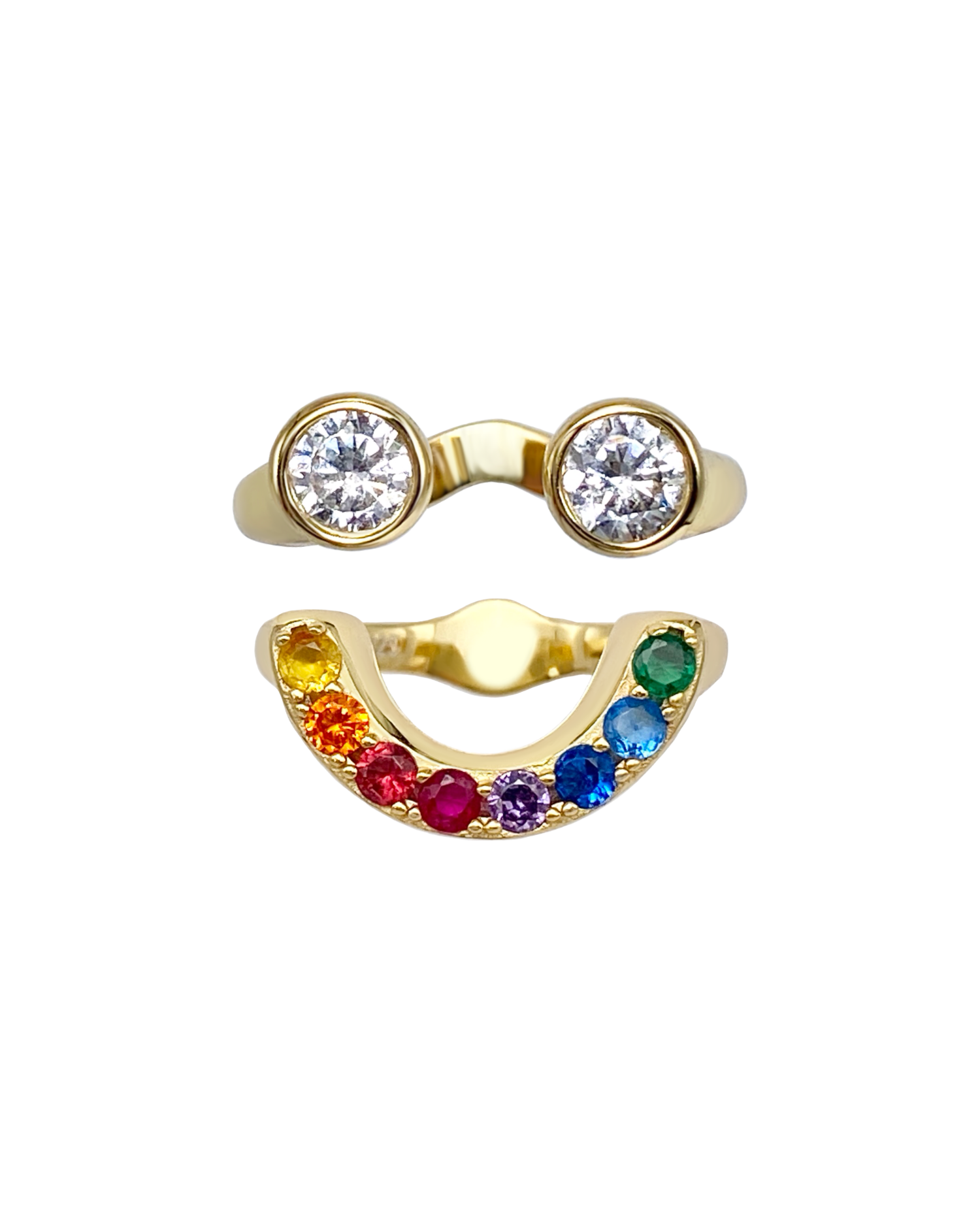 Gold ring with two circular gemstones and a rainbow-colored gemstone band that together form a smiley face ring set.